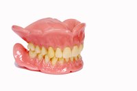 Practice speaking with dentures to get used to them.