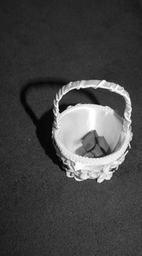Add a personal touch to your wedding ceremony by making your own fabric flower girl basket.