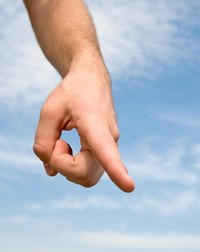 Learn how to properly remove loose skin from the finger to prevent infection.