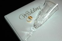 Create two wedding invitations on one page in Microsoft Word.