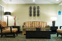 Use a foam upholstery cleaner and a cloth to clean your Dutailier cushions.
