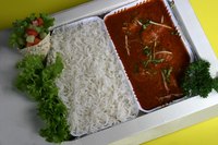 Indian food including rice, which is a staple of the cuisi111ne
