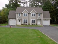 This duplex maximizes the lot space by building up, not out.