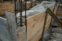 Foundations are constructed with vents according to code.