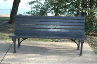 Painting a park bench may restore its original luster.