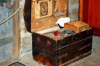 Polishing the trunk's wood and its iron fittings require separate methods.