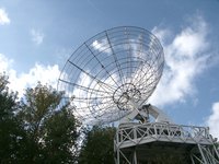 The parabolic shape of a satellite dish is similar to that used in some parabolic roofs.