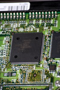 An EMI filter on a circuit board decreases circuit disruptions.