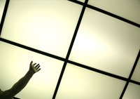 Change the level of a suspended ceiling by reinstalling the structure.