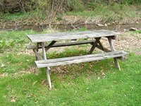 This old picnic table gives you complete freedom to attempt to transform it.