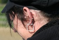Make ear piercings larger with tapers.