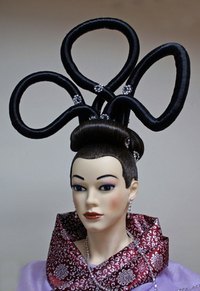 Give a mannequin a new look with paints easily available from hardware stores or craft shops.