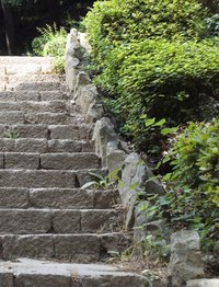 You don't have to be a stone mason to build rock steps.