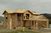 Rafters are angled beams supporting the roof, while joists are the horizontal beams.
