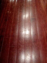 Use acrylic floor paint on wood floors.