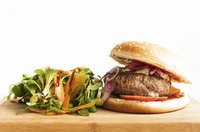 A green salad is just one option to serve alongside a hamburger.