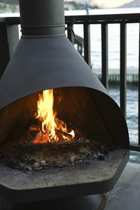Wood fire pits are made from a variety of materials.