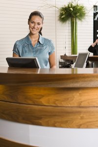 Spa attendants work at the front desk of the spa facility.
