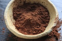 A bowl filled with cocoa powder.