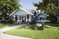 A walkway adds an inviting touch as long as it doesn't threaten a basement foundation.