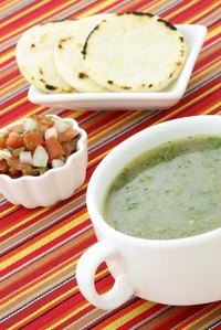 Serve plain arepas alongside soups and salads as you would bread.