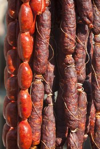 Sausage links can be tied off with string or simply twisted, depending on their casings.