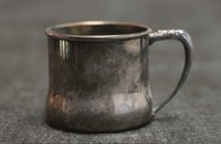 Sheet tin requires cutting, folding and seaming to make a tin cup.