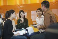 A group of people are having a business discussion.
