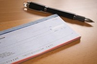 A check book and a pen.