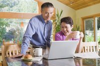 Couple looking at laptop