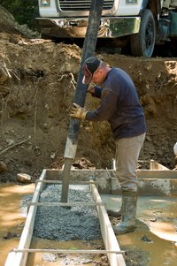 Concrete footers support the foundation of a building.