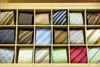 Silk ties for sale at a shop.
