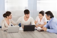 Co-workers going over RACI chart