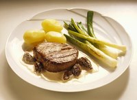 With practice, you can determine the doneness of a steak by pressing on it with your finger.