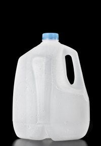 Milk jugs are translucent enough to trace Christmas shapes.