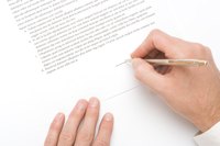 Man signing a document
