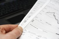 Close-up of man holding business report