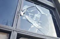 Broken windows are deductible rental property repairs.