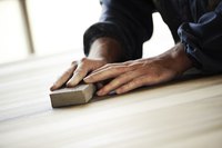 Use a sanding block for extra-smooth tabletops and flat surfaces.
