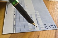 Filling out a bank deposit slip.