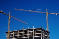 Putting up a framework of girders involves hard costs.