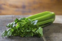 Cut the leaves off the celery and keep them to use in soups and stews.