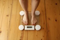 Woman standing on scale