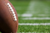 Close-up of football on football field