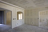 Install drywall before flooring.