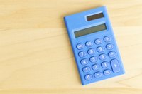 Close-up of blue calculator on table