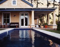 Limiting the use of stainless steel in a pool helps.