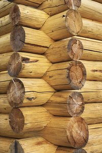 Log cabin walls are made solely of wood.