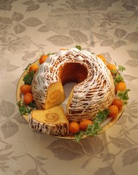 Drizzling thinned frosting on cakes produces a light, lacy effect.