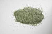 Sowing grass seed provides a green surface in a Grasscrete parking lot.
